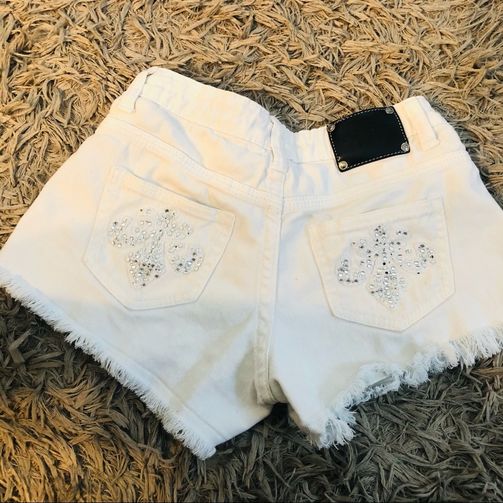 Red Rivet white short shorts
